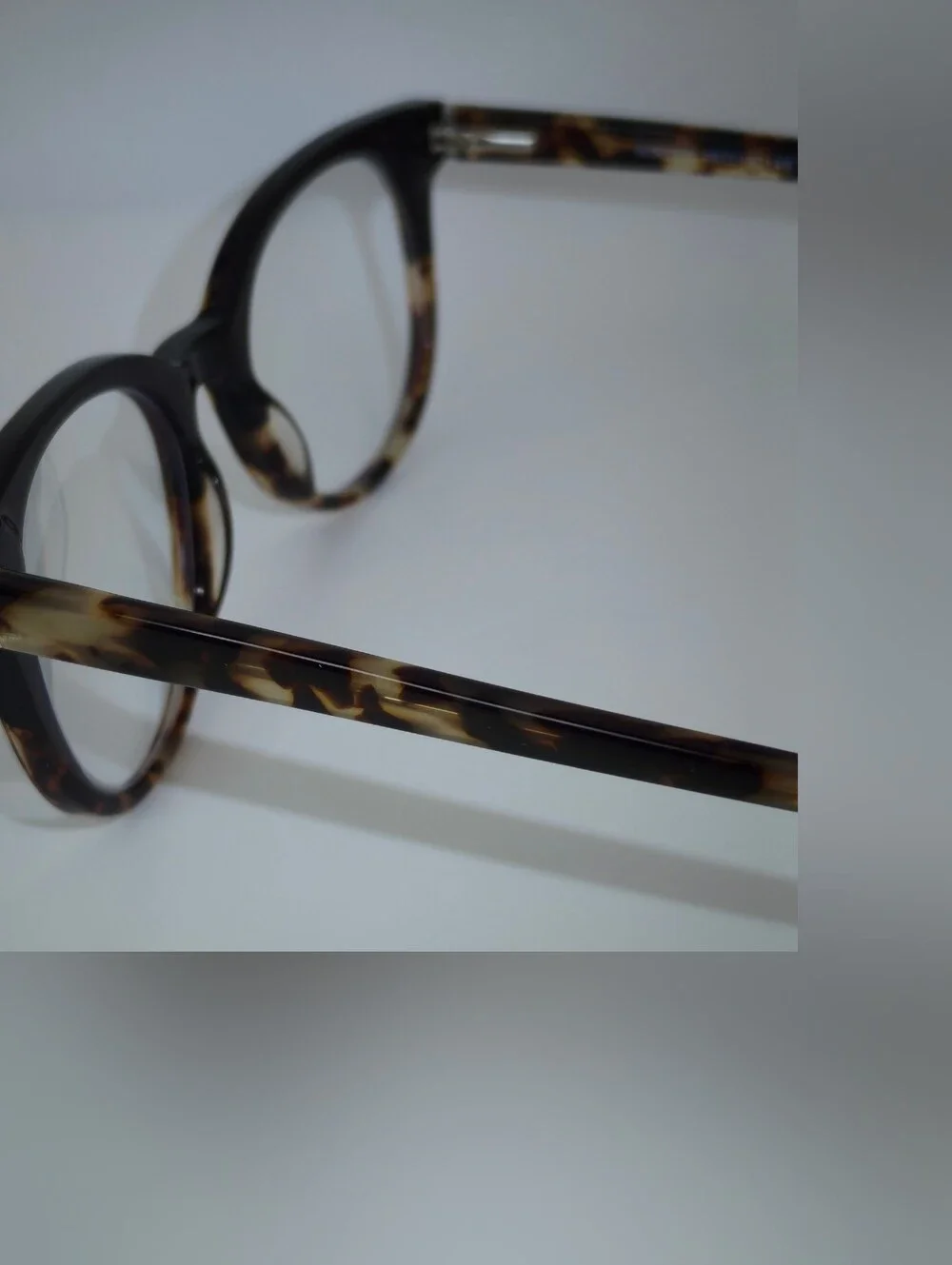 Rialto. Classic Round Black Upper, Animal Print Lower And Temples.